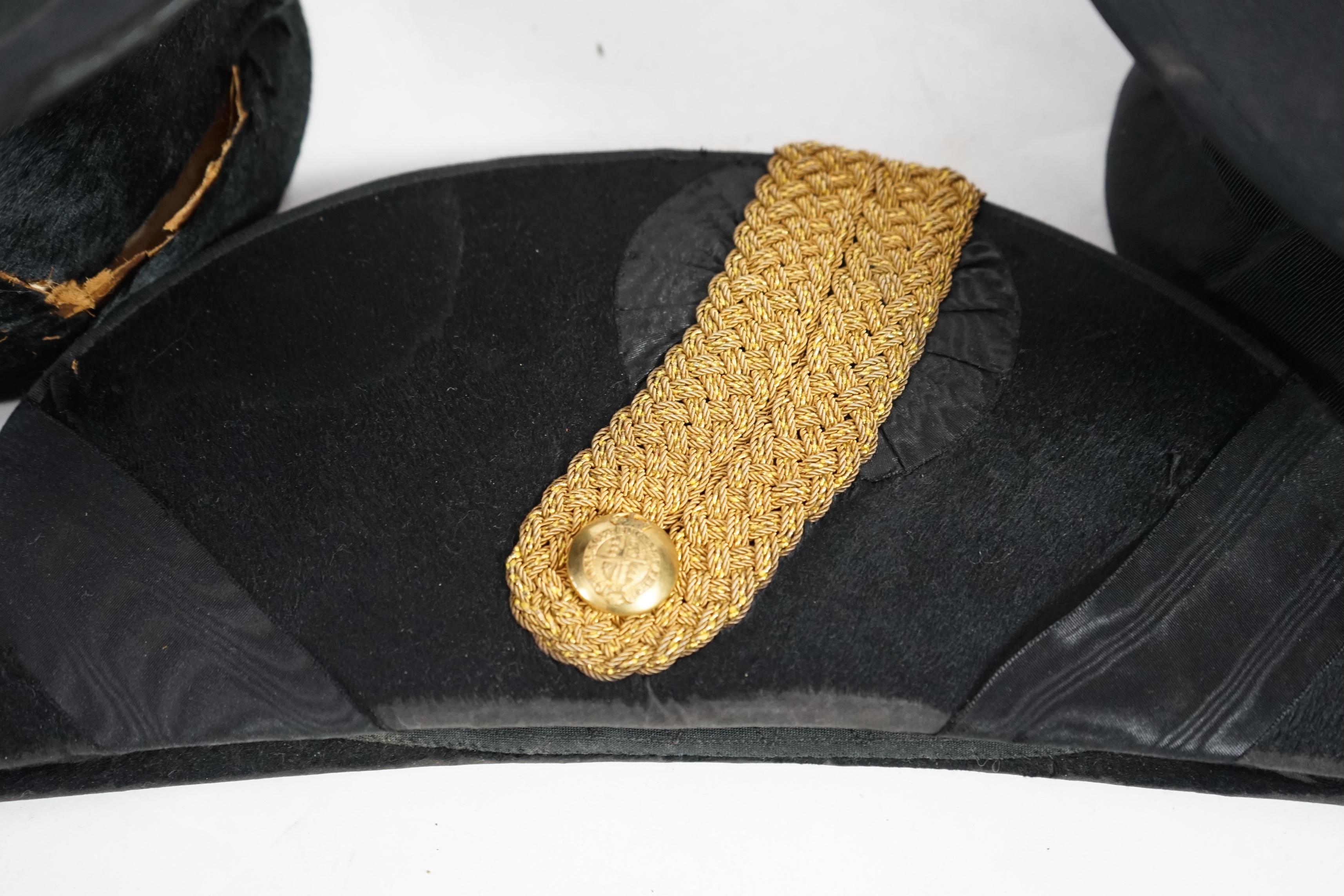 A Victorian Officers bi-corn hat in original tin case